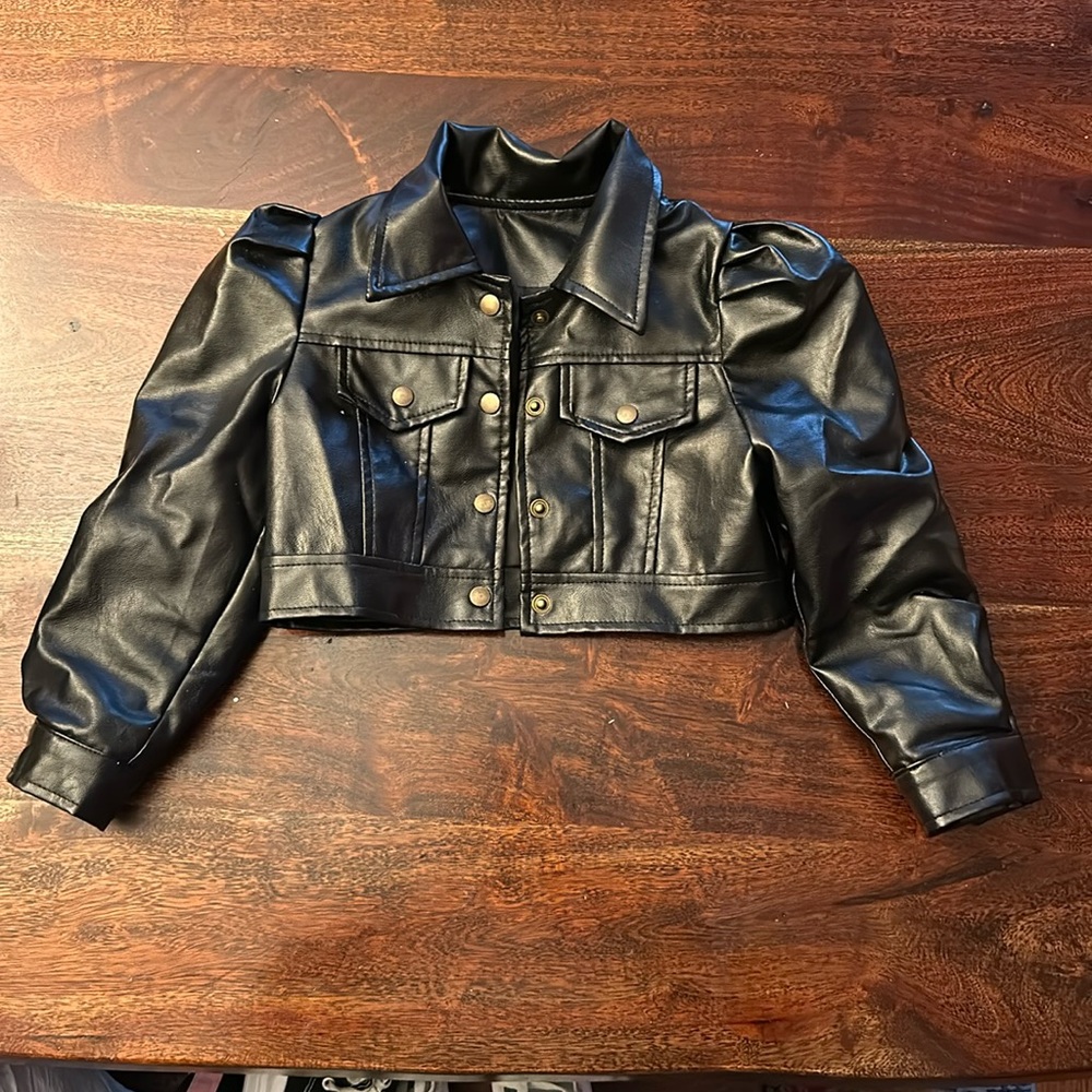 Gently used faux leather coat for girls